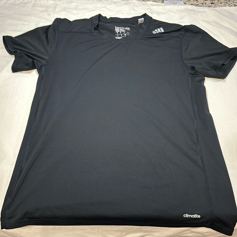 Adidas men’s size Medium techfit climalite shirt.